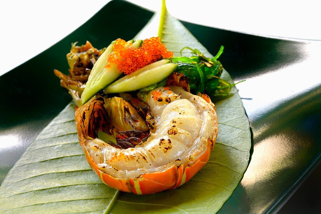 Grilled lobster tail on a banana leaf (Asia)