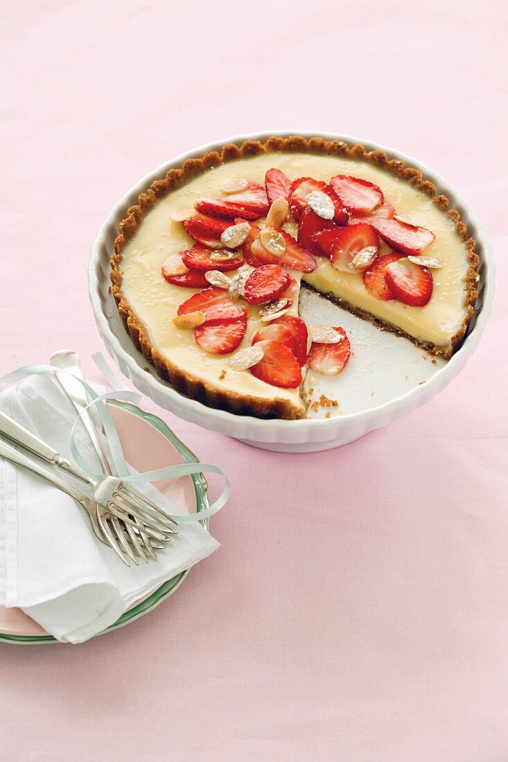 White chocolate tart with strawberries and almonds