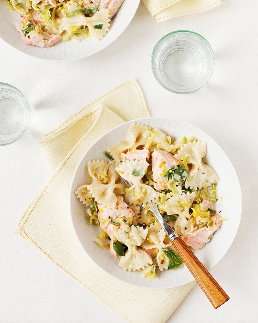 Farfalle pasta with salmon, leek and mint in a lemon and caper sauce