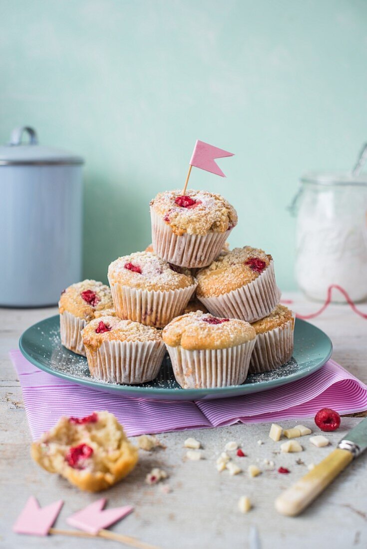 Raspberry muffins with white chocolate on a plate
