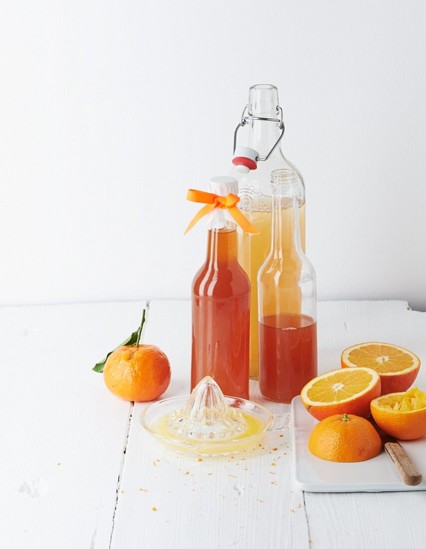 Homemade orange syrup in bottles