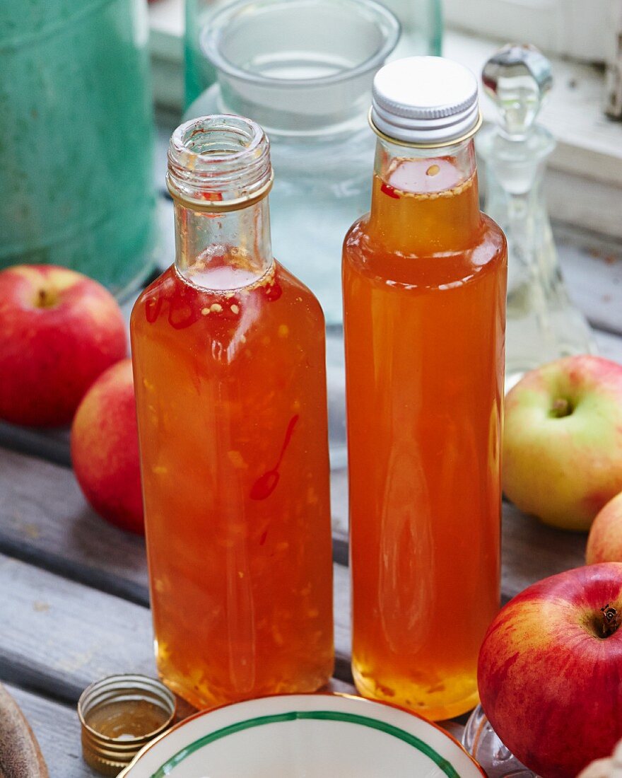 Homemade apple and chilli sauce in bottles