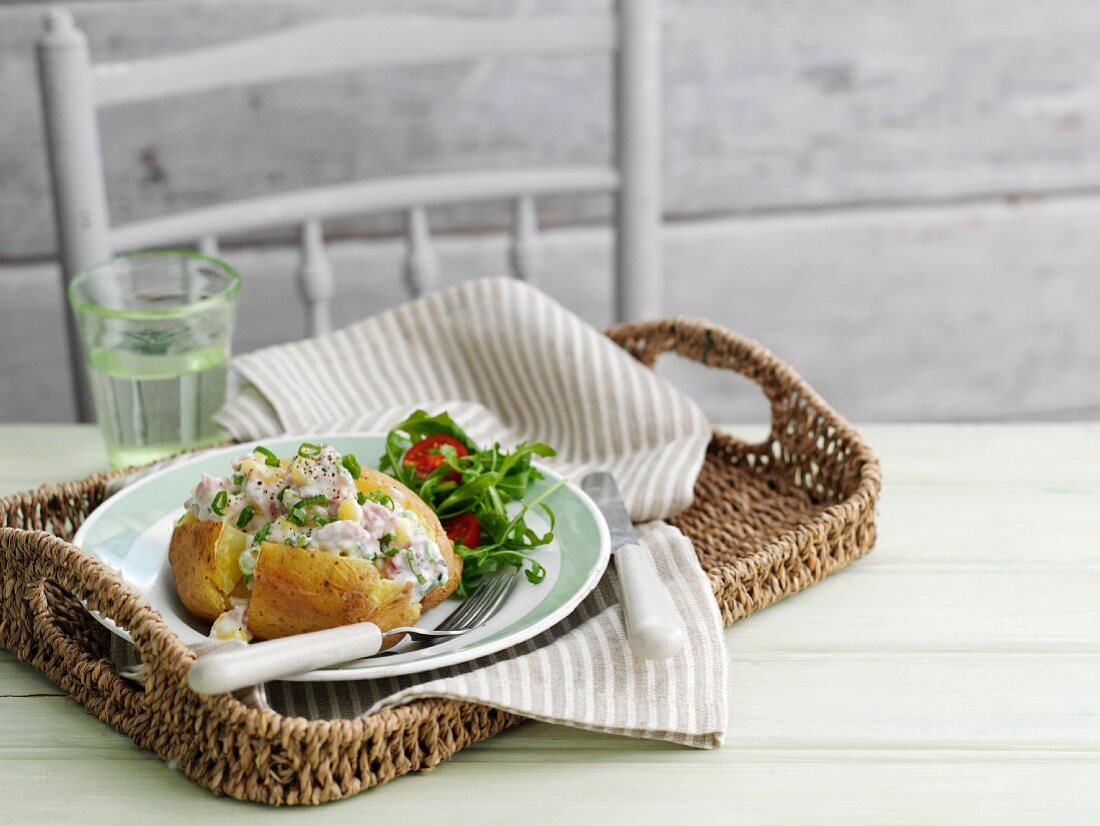 A jacket potato field with creamy chicken and pineapple