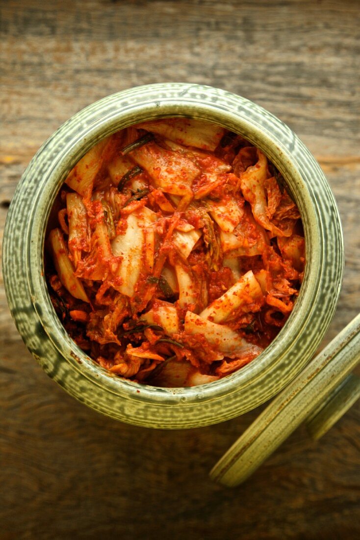 Kimchi (lactose-fermented vegetables, Korea) in a ceramic jar