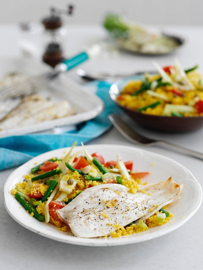 Grilled lemon sole with golden couscous and fennel