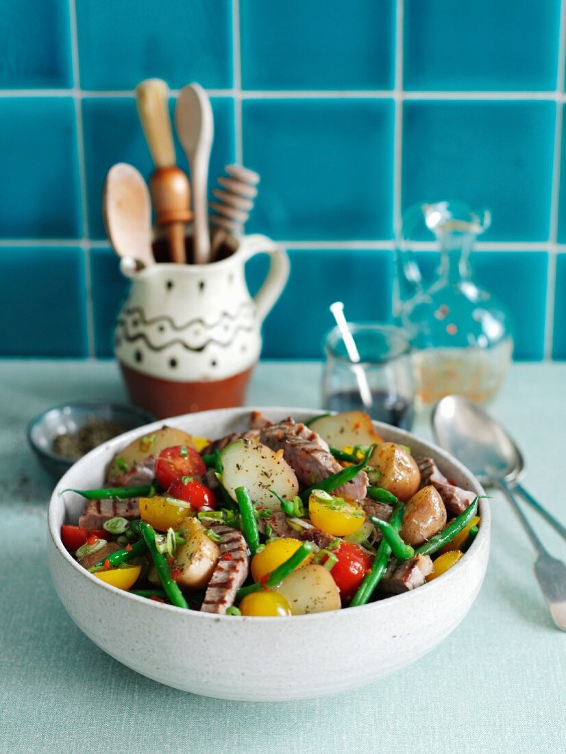 Lamb salad with green beans, potatoes and cherry tomatoes