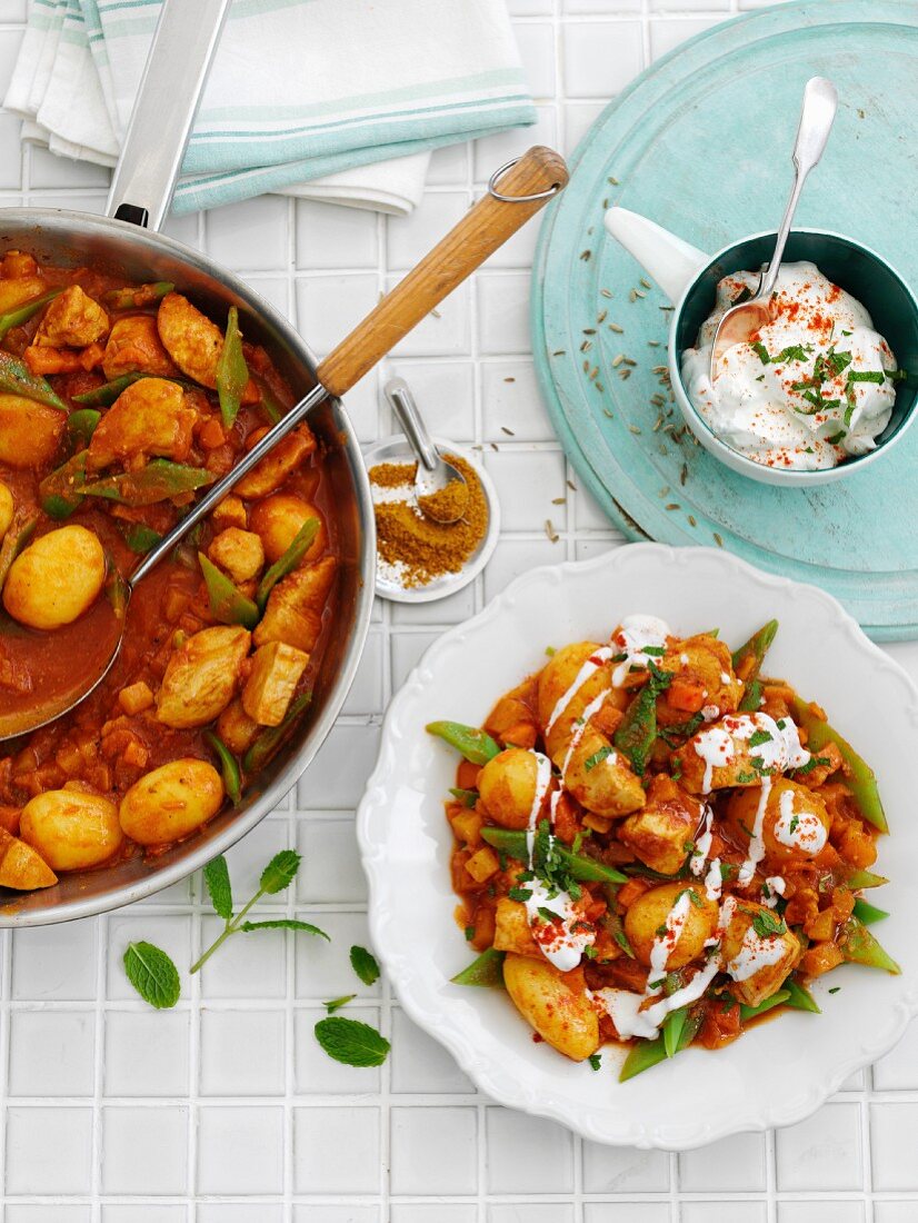 Mild chicken curry with potatoes and vegetables