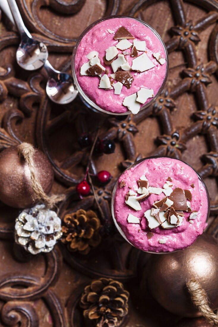 Coconut and raspberry mousse with chocolate sprinkles for Christmas