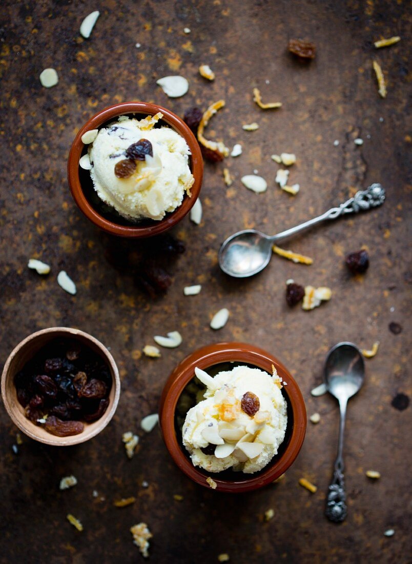 Vanilla ice cream with dried fruit and almonds (seen from above)