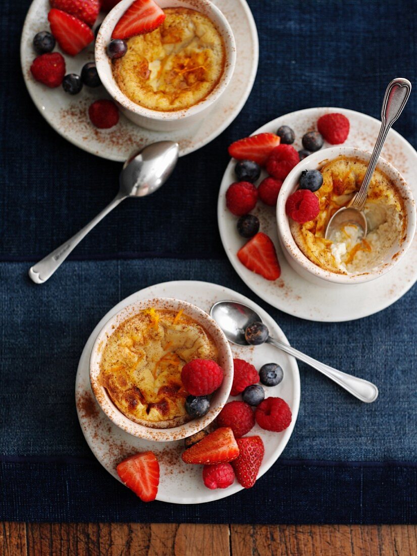 Baked egg custard with berries (England)