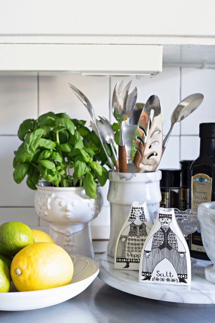 Marble kitchen utensils, basil and whimsical salt and pepper shakers