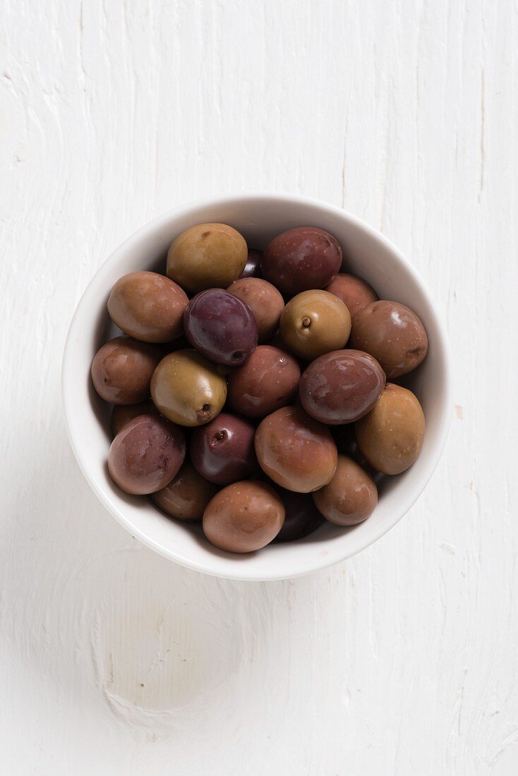 Baresana olives in a white bowl