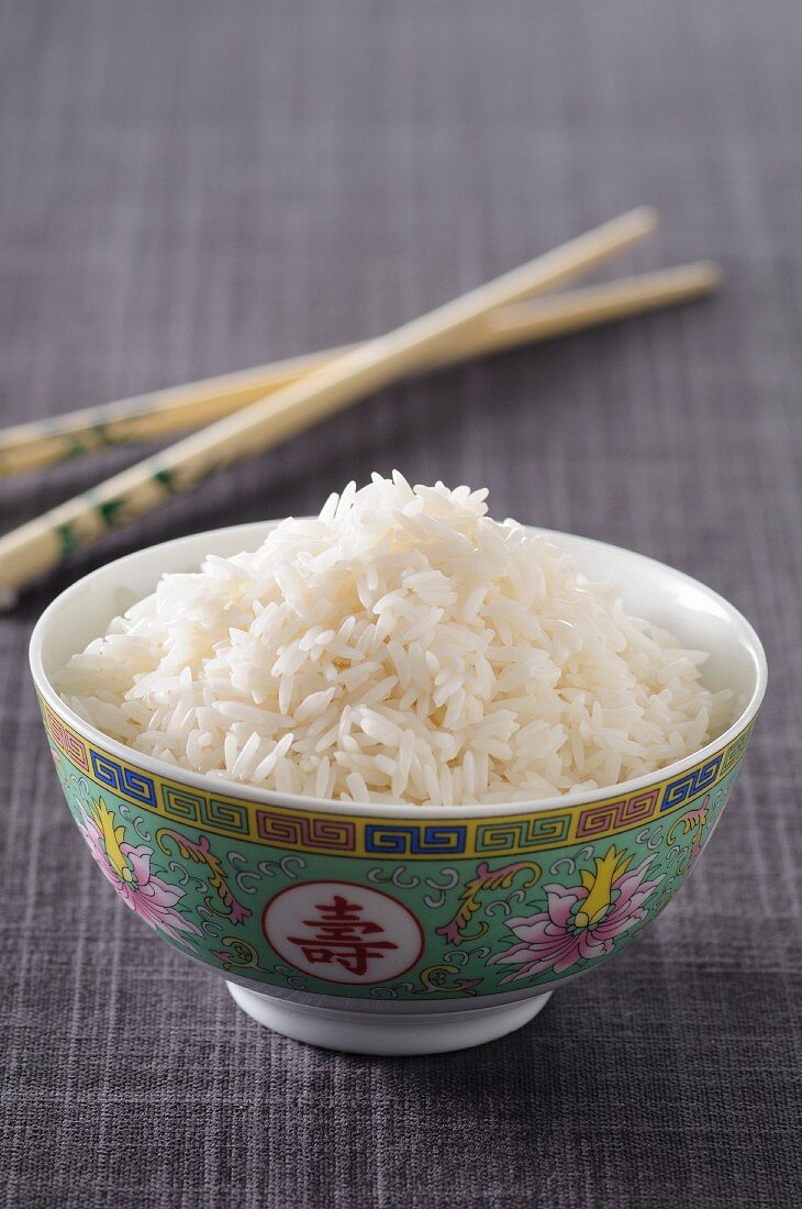Cooked rice in a porcelain bowl