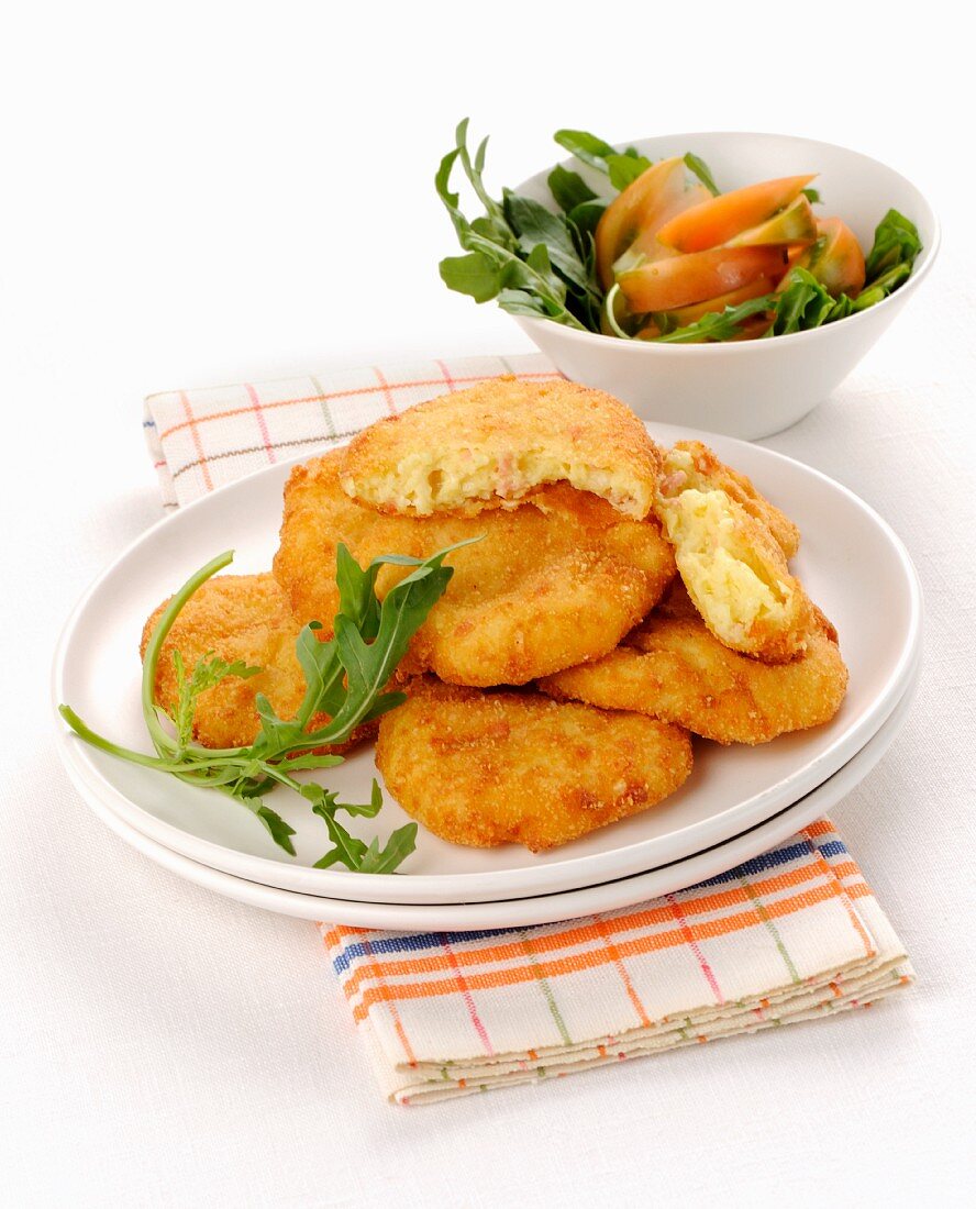 Potato fritters with salad