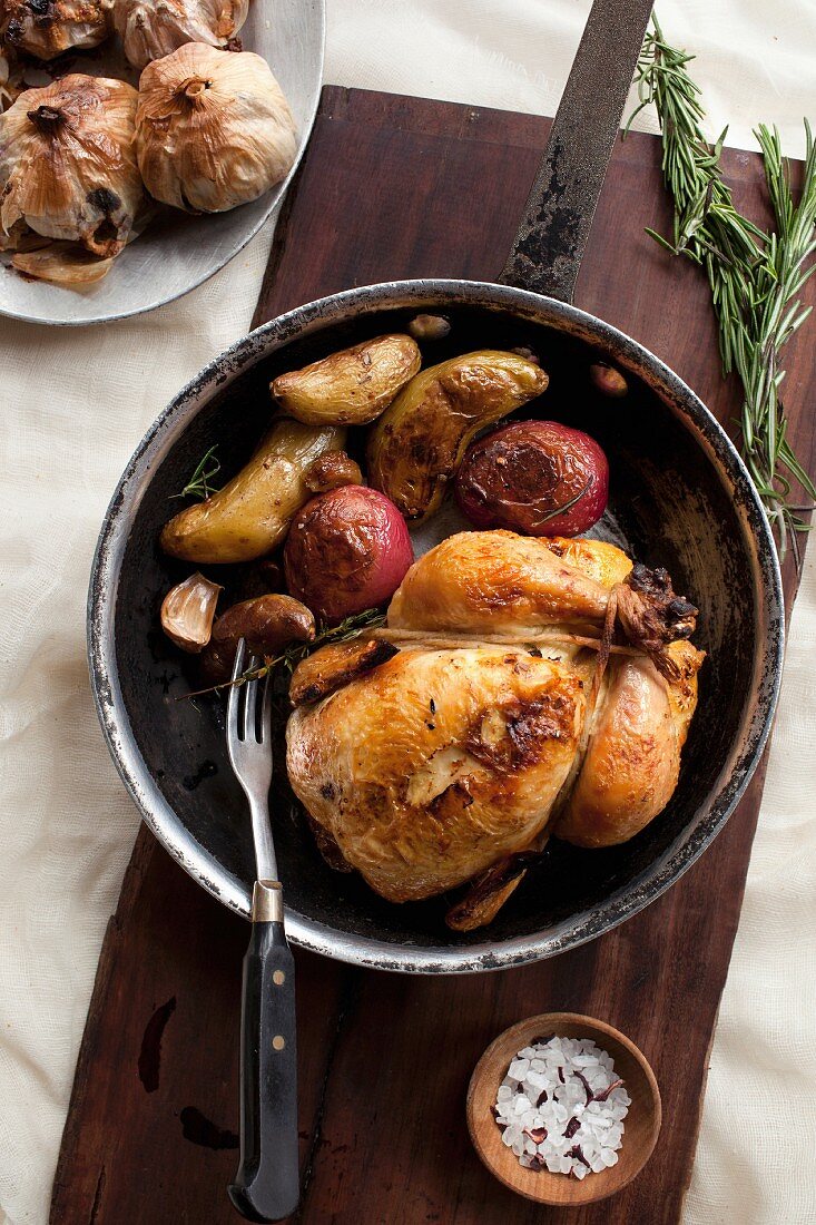 Roast chicken and vegetables in a pot
