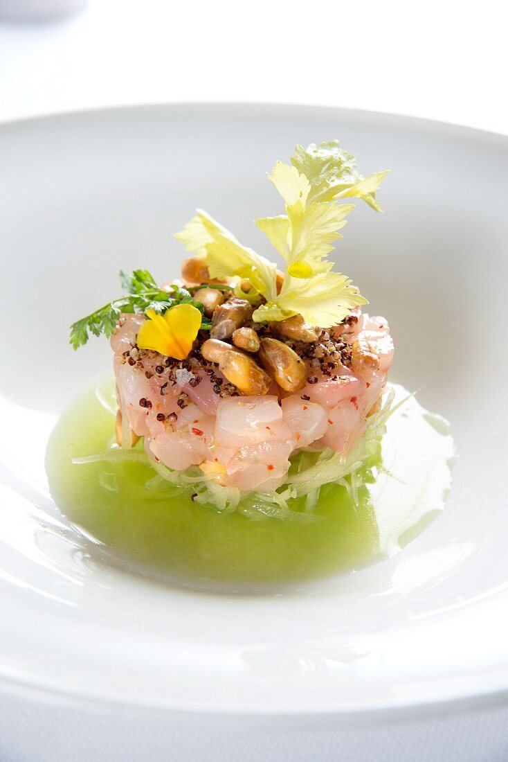 Tartare of yellowtail mackerel on julienned cucumber