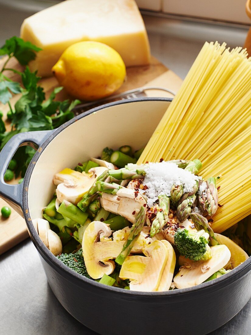 Ingredients for noodle soup with chicken, mushrooms and vegetables