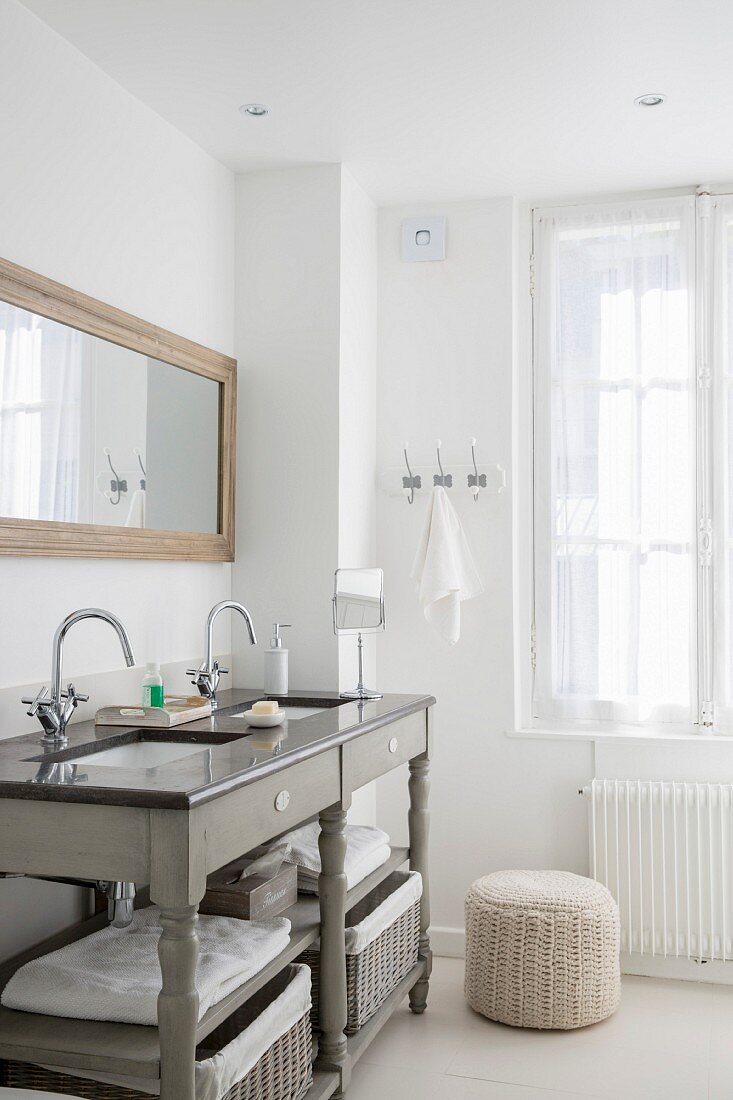 Grey washstand in bathroom