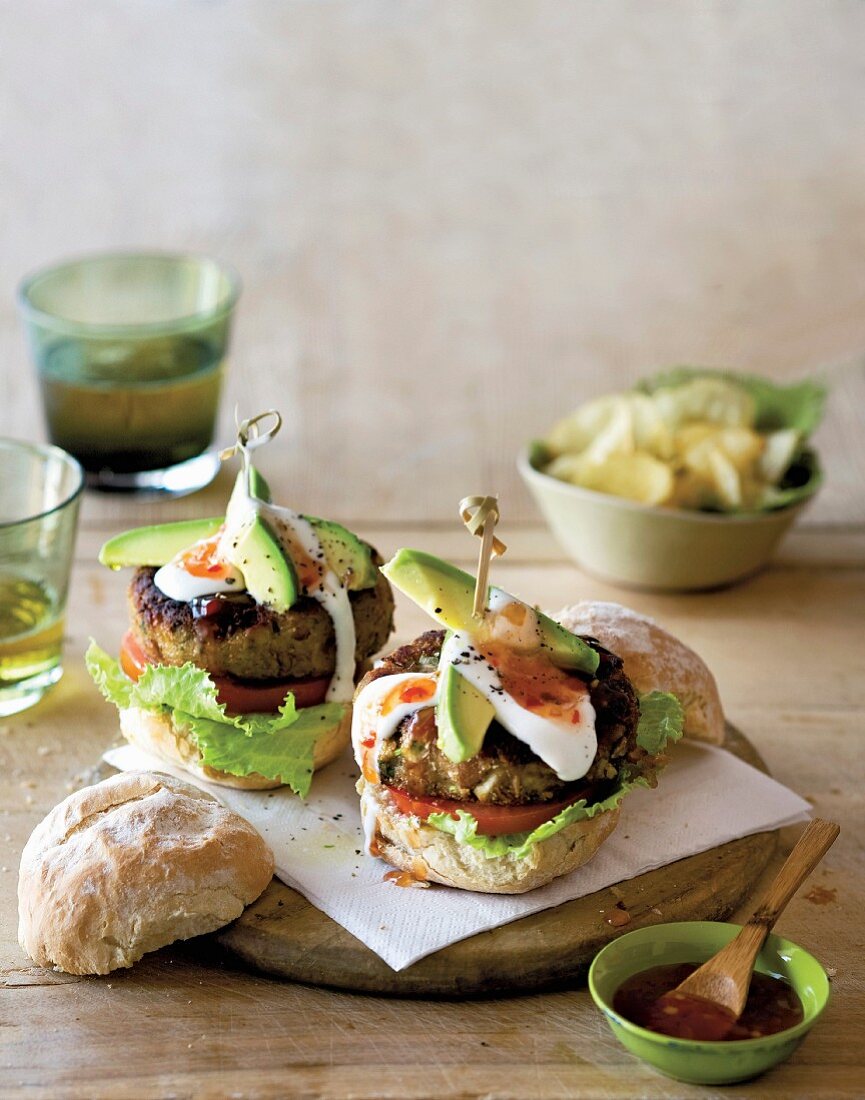 Mexican bean burgers with avocado, yoghurt and chilli sauce