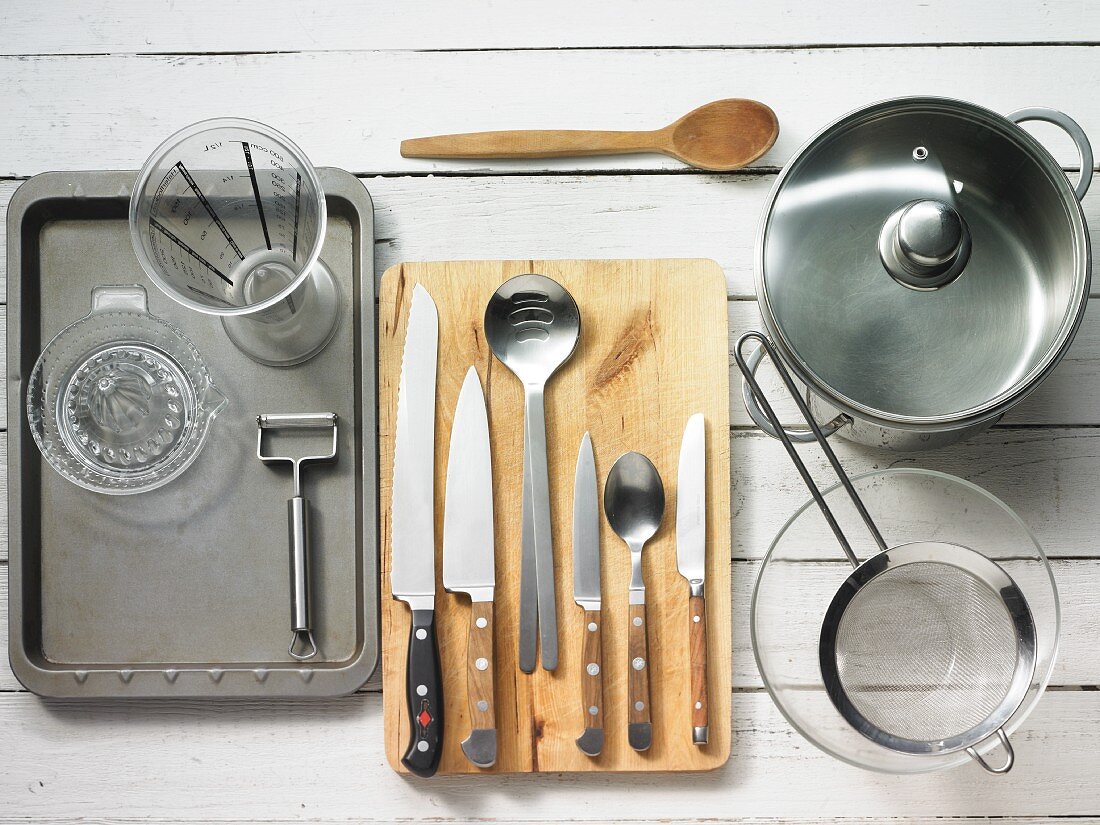 Kitchen utensils for making vegetable salad with crostini