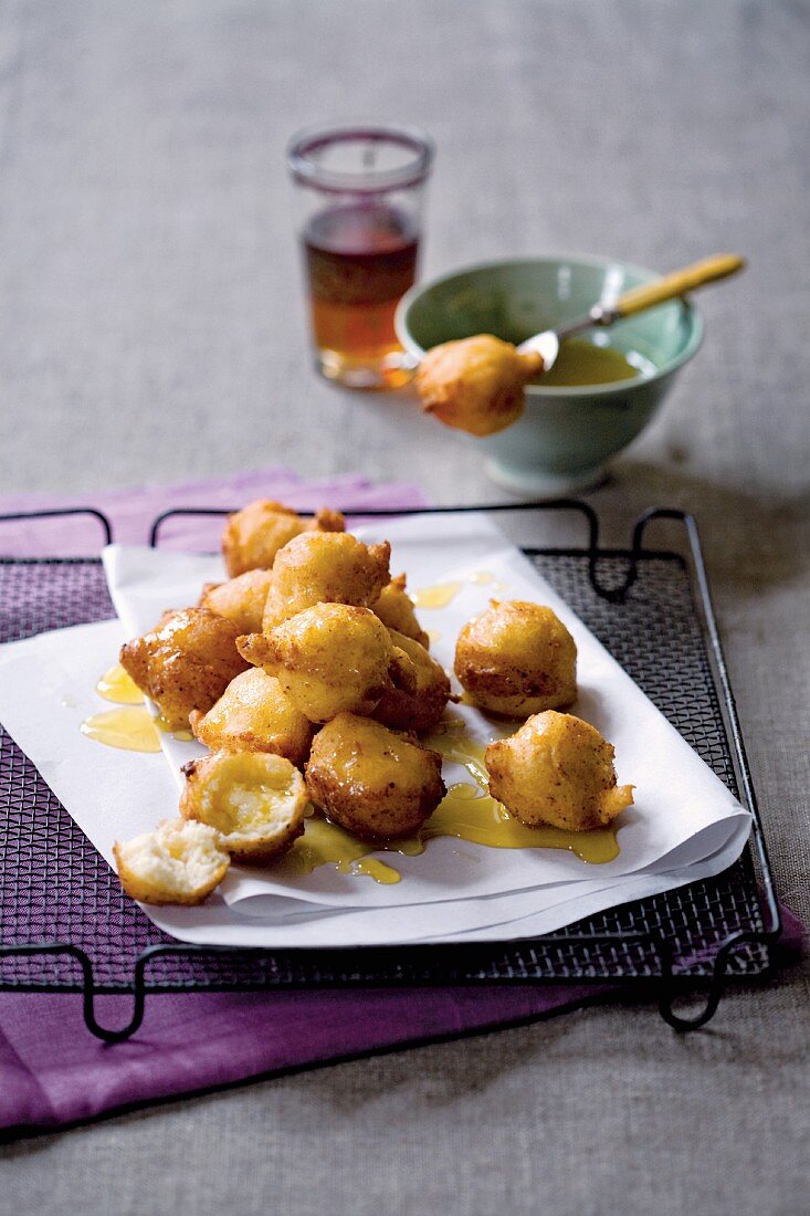 Deep-fried honey and ricotta balls flavoured with orange
