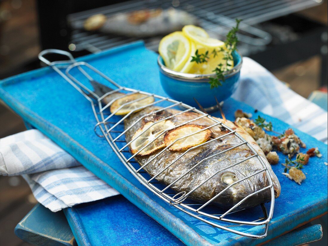 Grilled seabream with an olive and tomato filling