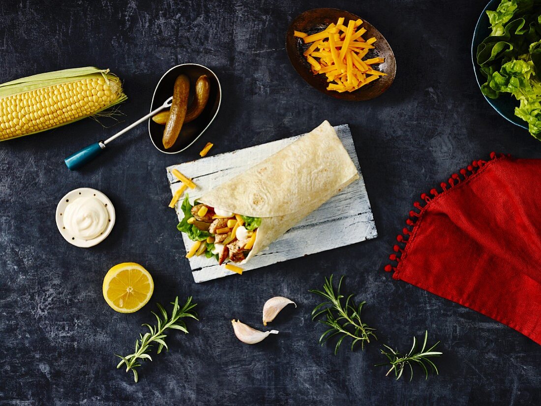 A chicken wrap with ingredients