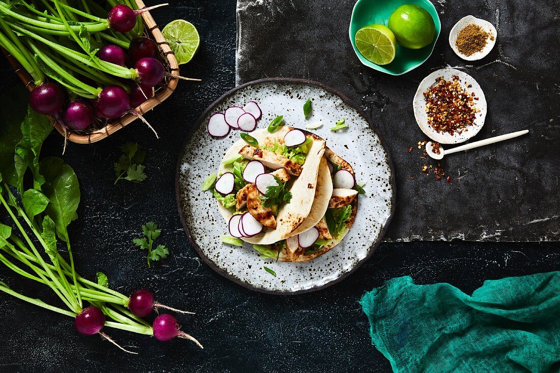 Tacos with chicken and radishes