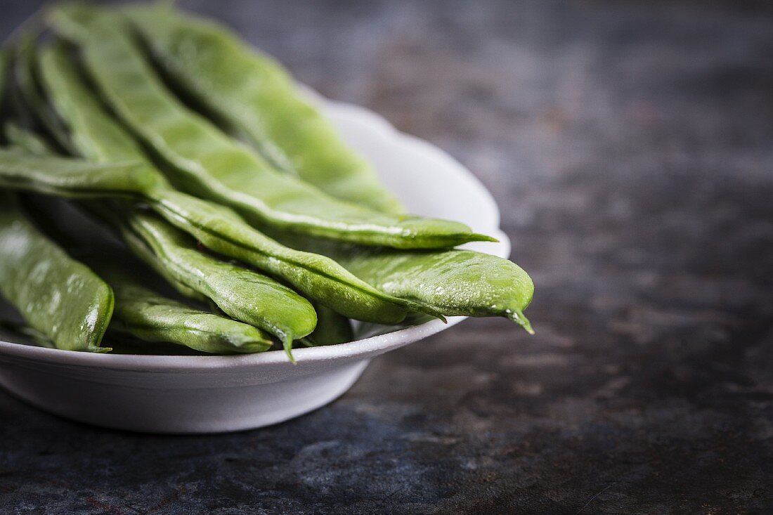 Freshly washed green beans on a plate