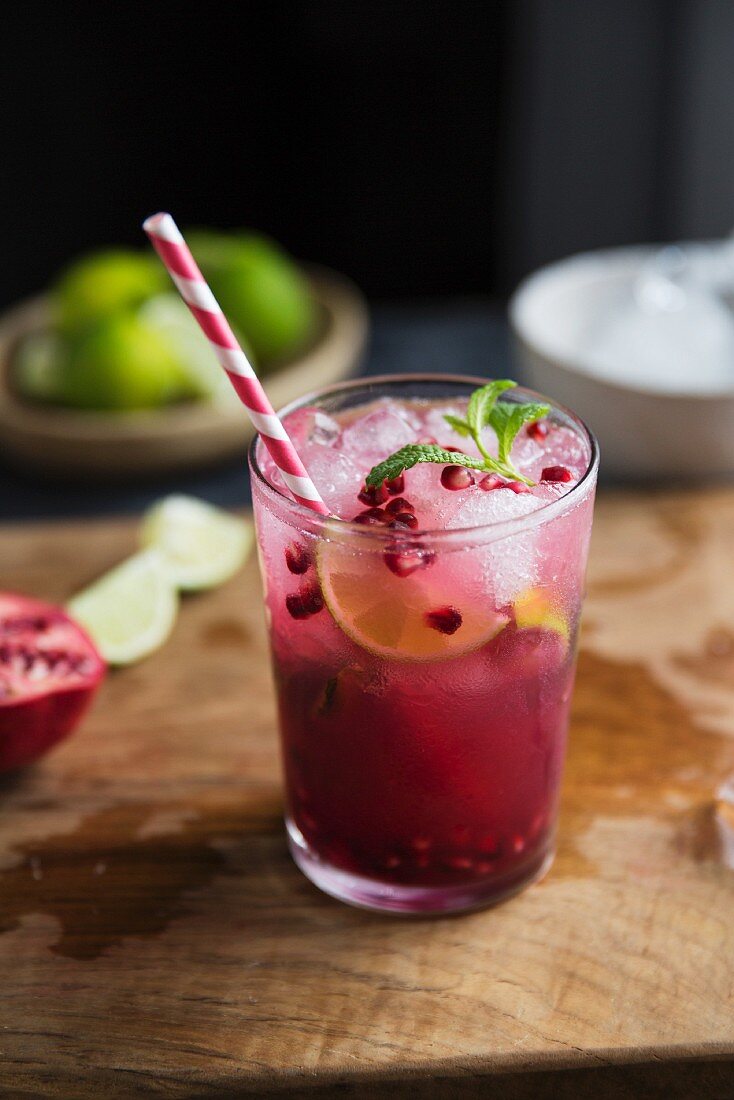 A pomegranate mojito with crushed ice