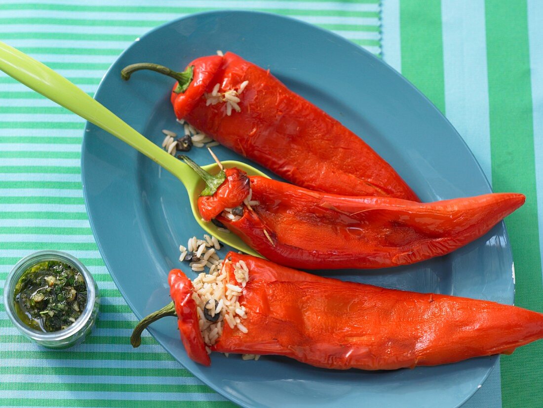 Pointed red peppers filled with rice and pesto