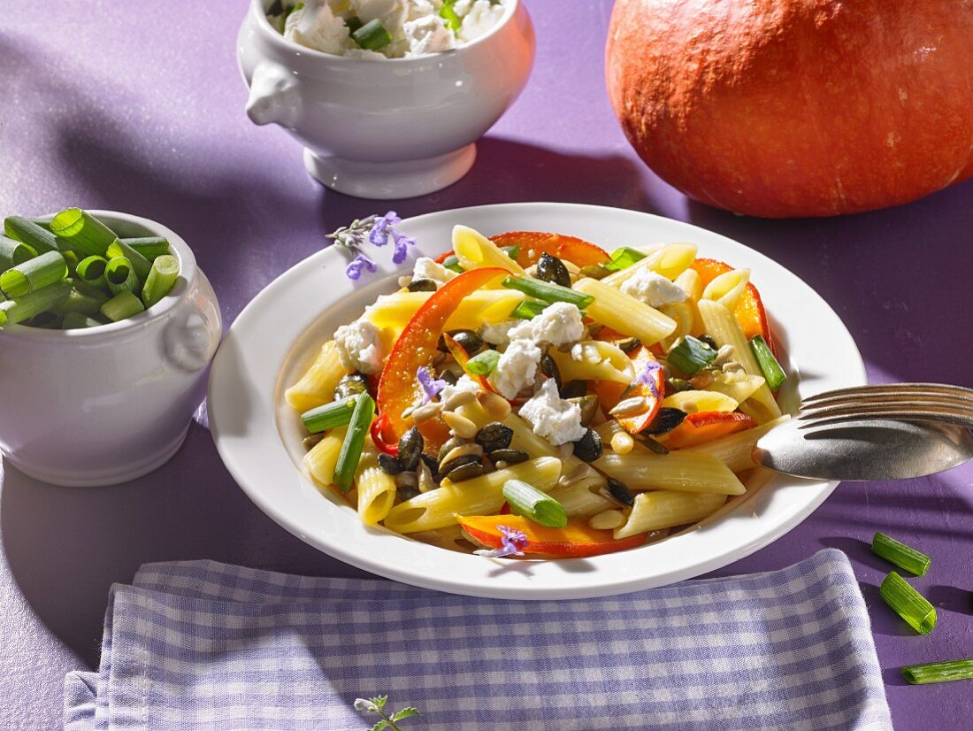 Pasta with pumpkin, feta cheese and sunflower seeds