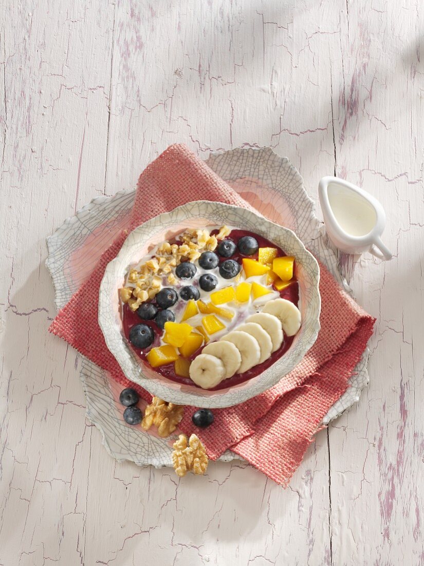 A banana and acai berry smoothie bowl