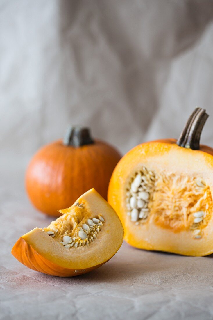 Pumpkins, whole and sliced