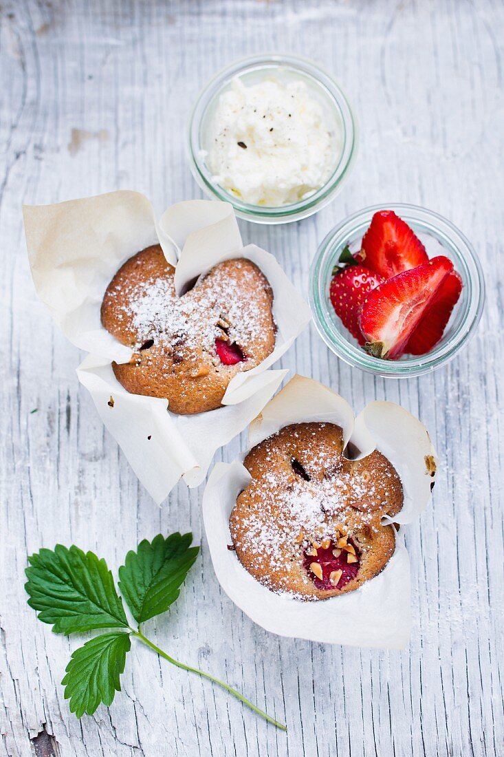 Strawberry muffins dusted with icing sugar