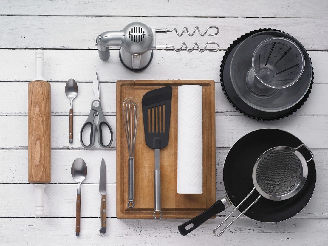 Various kitchen utensils for making a tart