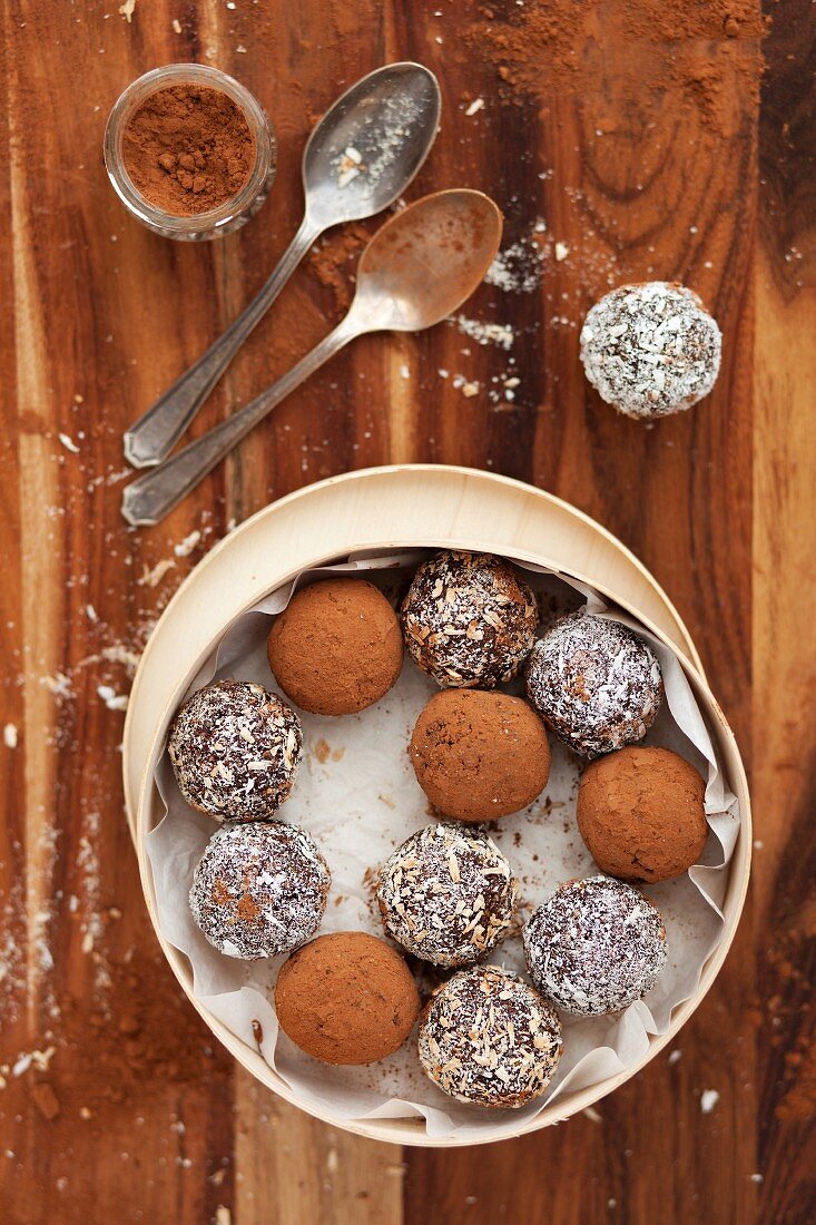 Date energy balls rolled in cocoa powder and desiccated coconut