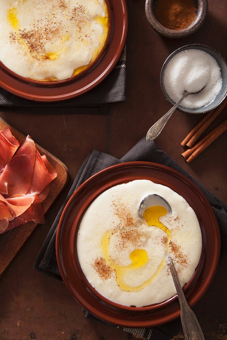 Rømmegrøt (traditional Norwegian porridge made with sour cream) with cinnamon and melted butter