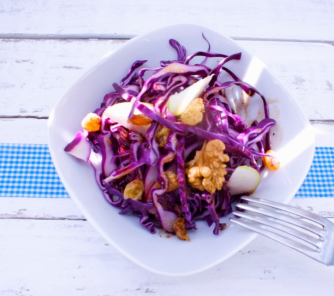 Red cabbage and apple salad with walnuts