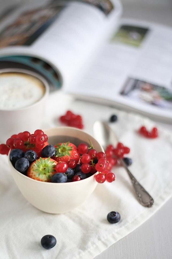 Summer berries in a white bowl for breakfast