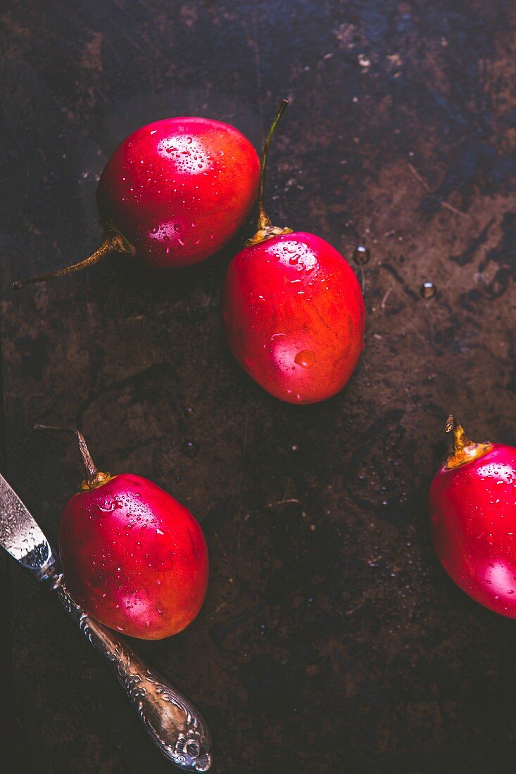 Tamarillos with drops of water