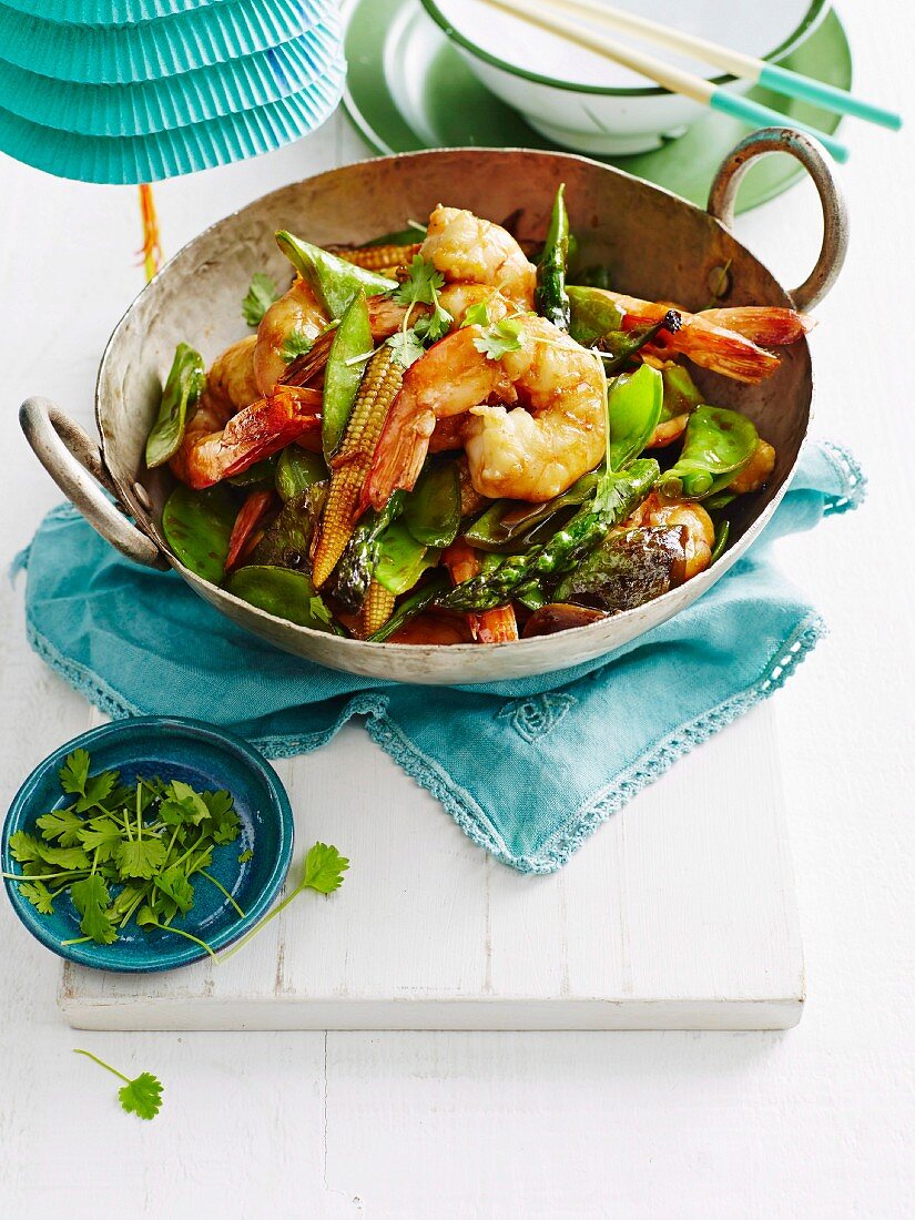 Stir-fried prawns with snow peas and baby corn