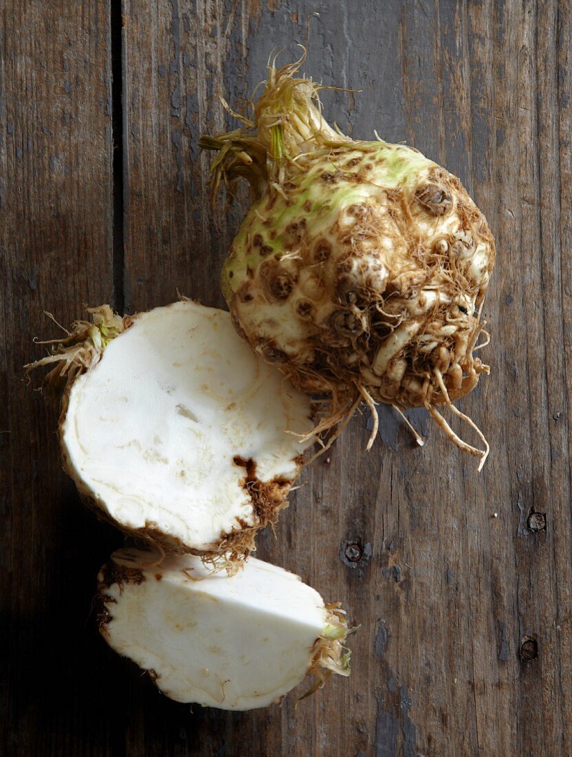 Celeriac on a wooden surface (seen from above)