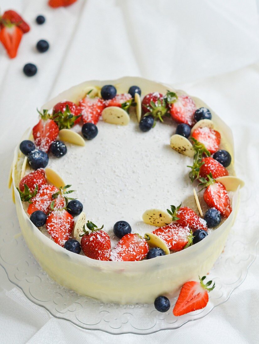 White chocolate mousse cake with strawberries and coconut