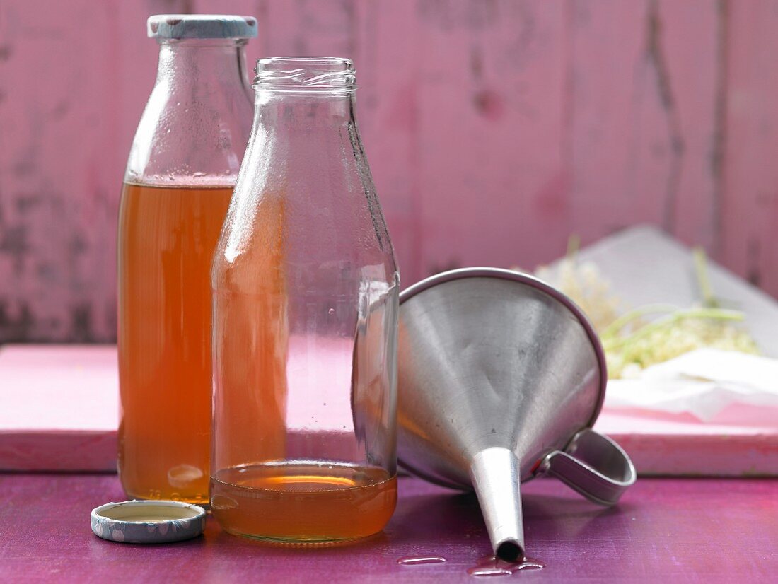 Elderflower syrup in glass bottles