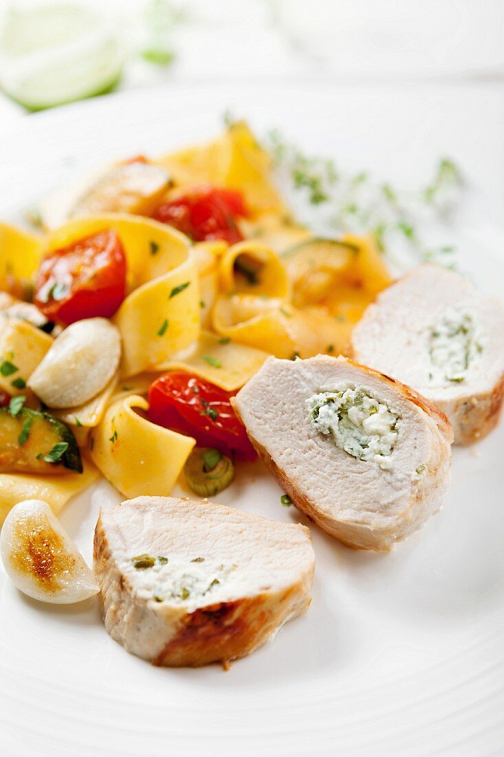 Chicken breast stuffed with goats' cheese served with tagliatelle