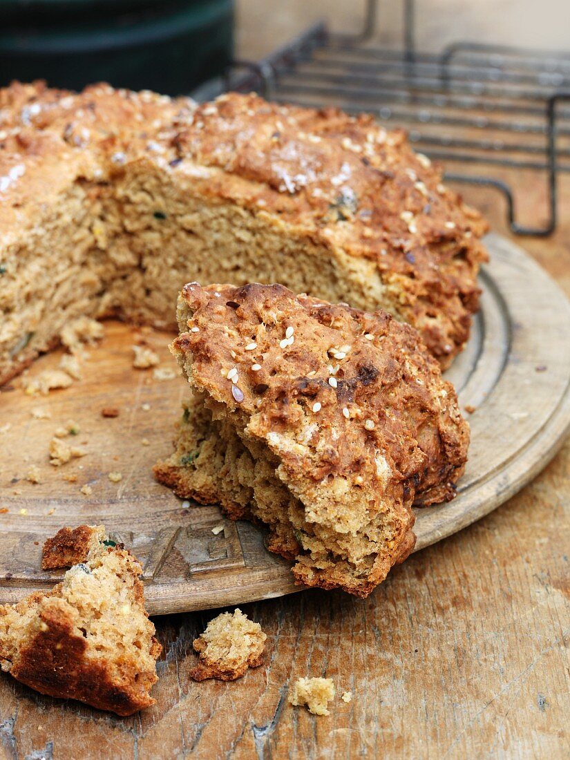 Rustic soda bread on a wooden plate