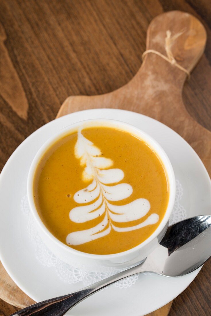 Butternut squash soup on a chopping board