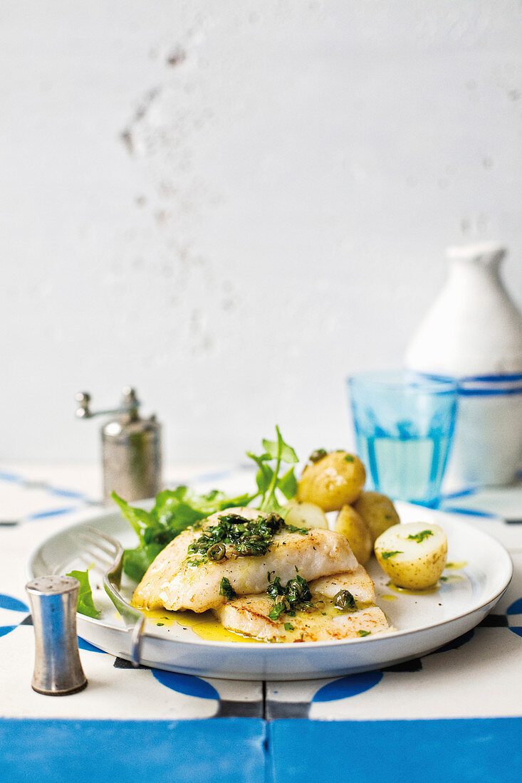 Baked hake fillets with salsa verde