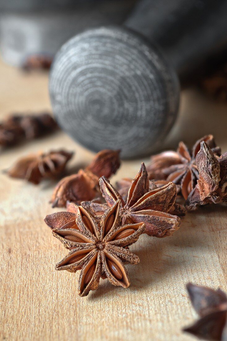 Star anise and a pestle